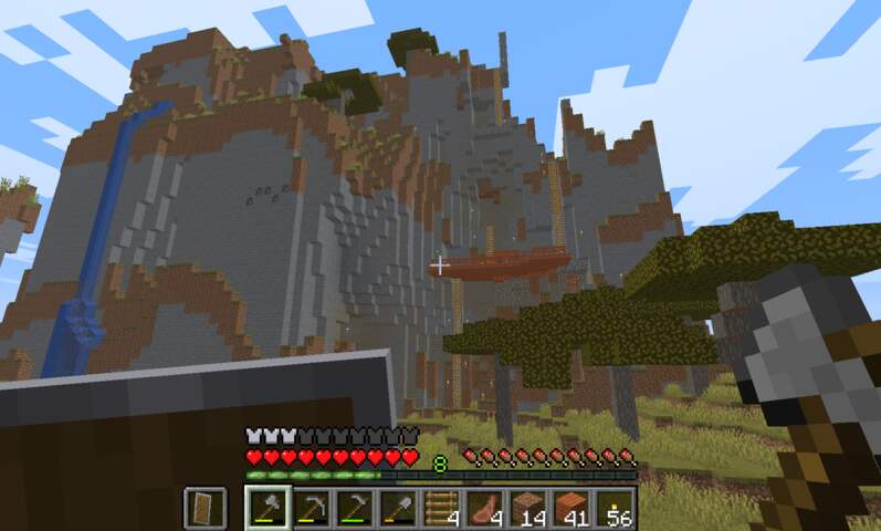 moutain with waterfall and a terrace like mountain base structure