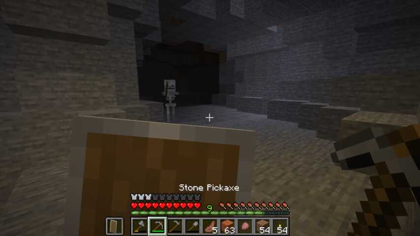 skeleton in stone cave, dark.