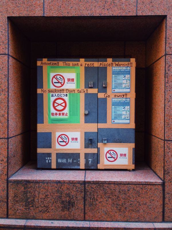 Photo - Makeshift English Non-smoking Signs on Duct Tape, photo by Rick Cogley