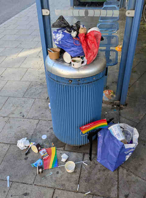 overflowing trashcan, pride edition