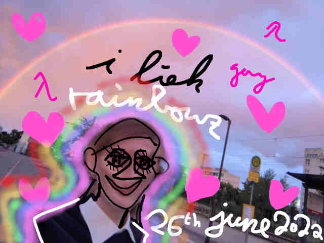 portrait of fruit in front of a rain-bow at a bus stop. edited digitally to say i liek rainbowz, ugly hearts