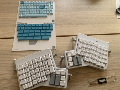 and just then? my new 'seafoam blue' keycaps arrived! i'm going to pull these clean white keys off and pop these baby blues on.