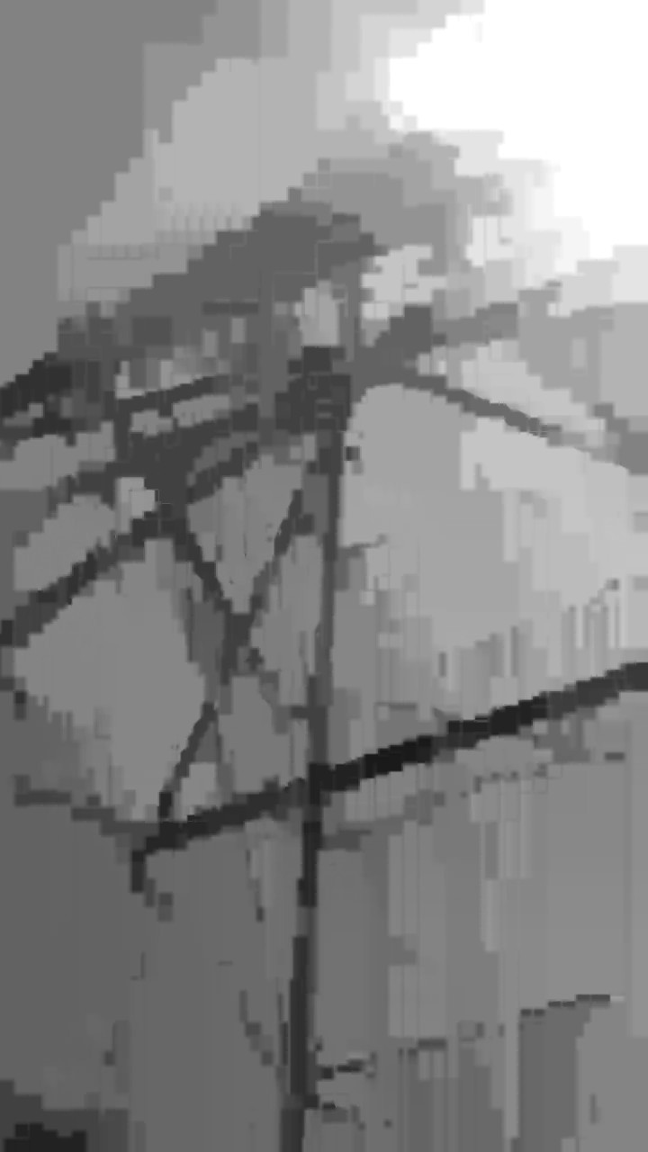 a very pixelated, glitchy image of a power transmission tower