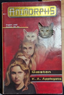 Book cover of the book 'Animorphs' depicting the transformation of a feminine human person into a cat